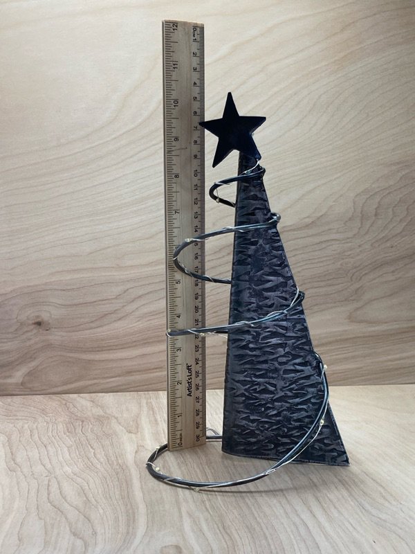 lighted metal Christmas tree